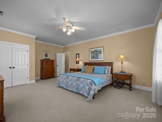 bedroom with visible vents, carpet floors, baseboards, and ornamental molding