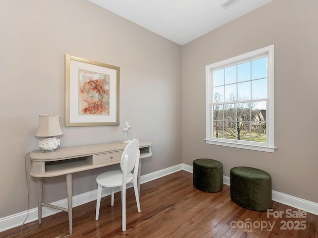 office with baseboards and wood finished floors