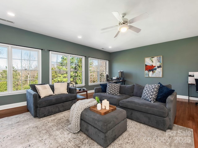 living room featuring visible vents, a ceiling fan, wood finished floors, recessed lighting, and baseboards