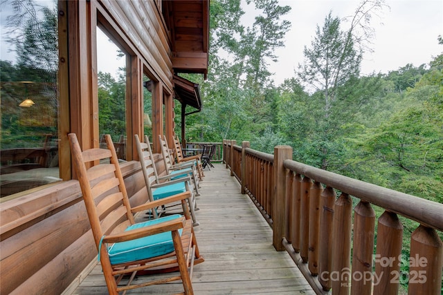 deck with a view of trees