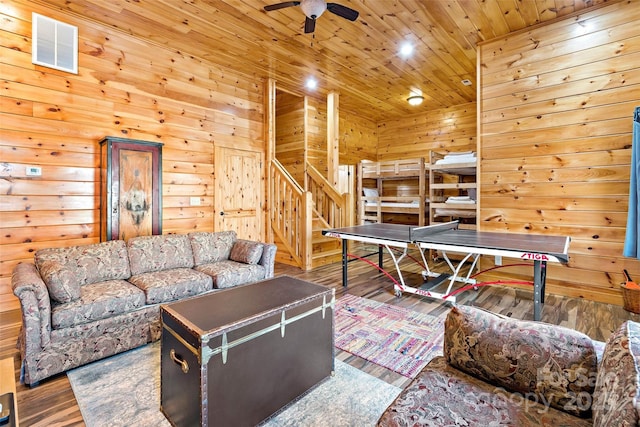 200 Blue Gill Dr, Lake Lure, NC 28746 - recreation room featuring visible vents, ceiling fan, wood walls, wood ceiling, and wood finished floors