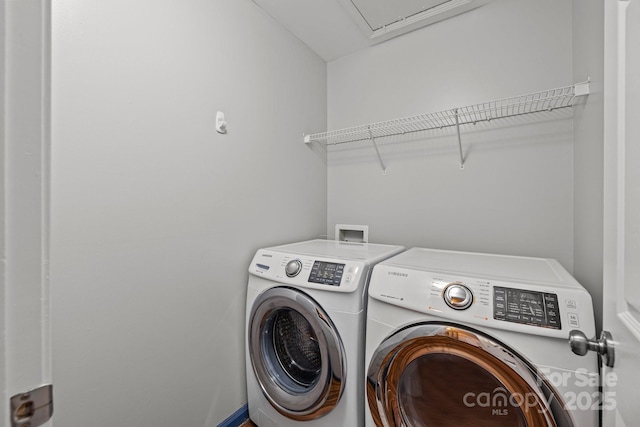 11712 Huxley Rd, Charlotte, NC 28277 - clothes washing area with washing machine and clothes dryer and laundry area