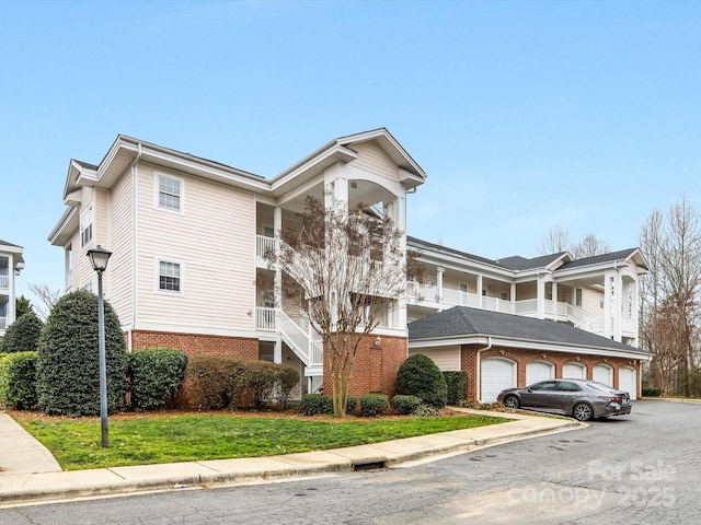 view of property featuring driveway