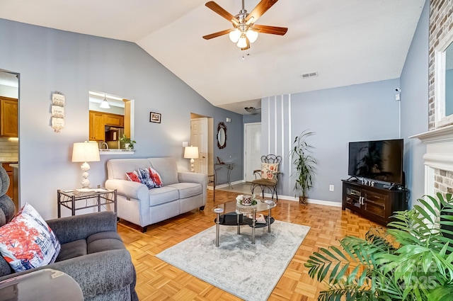 living room with high vaulted ceiling, a ceiling fan, visible vents, and baseboards