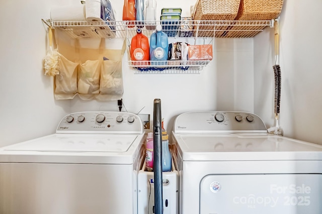 clothes washing area featuring laundry area and independent washer and dryer