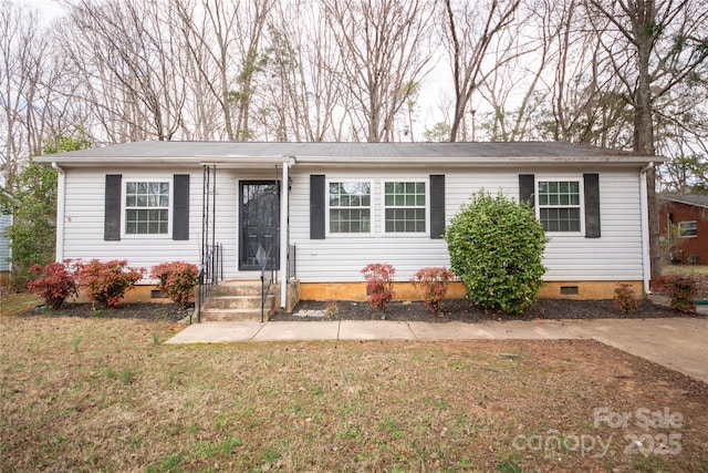 single story home with crawl space and a front lawn