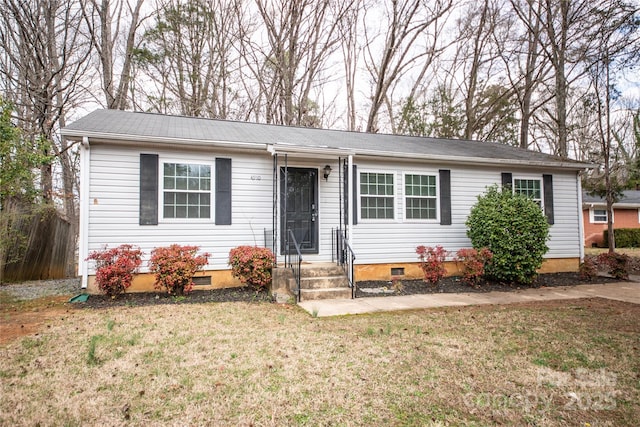 ranch-style house with crawl space and a front yard