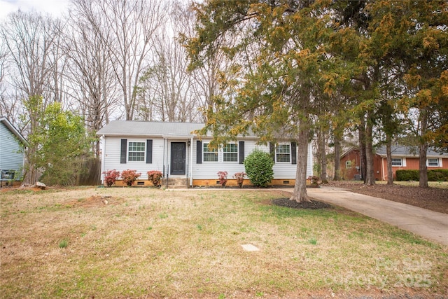 view of front of house with entry steps, driveway, a front lawn, and crawl space