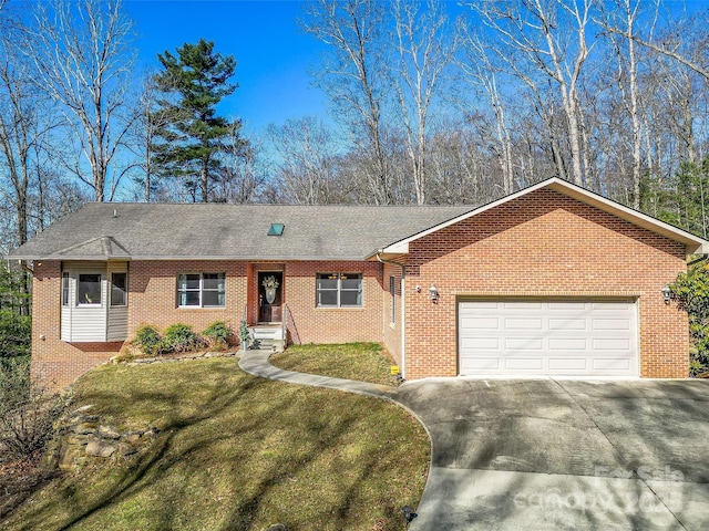 ranch-style house with a front yard, an attached garage, a shingled roof, concrete driveway, and brick siding