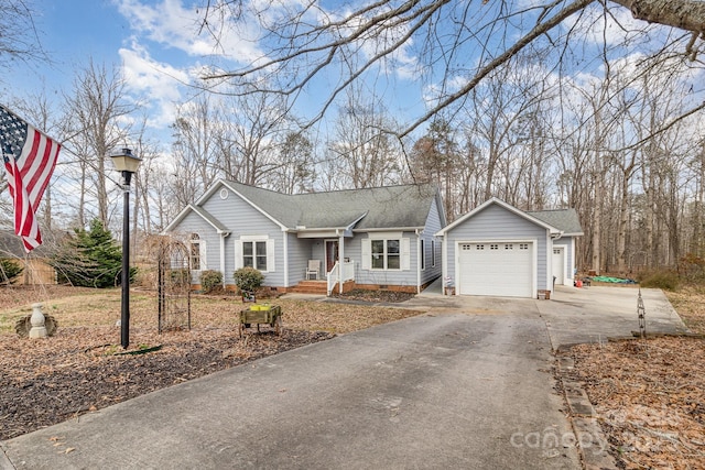 ranch-style house featuring a garage, crawl space, driveway, and roof with shingles