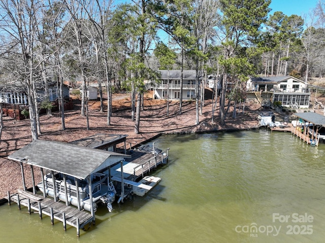 dock area featuring a water view