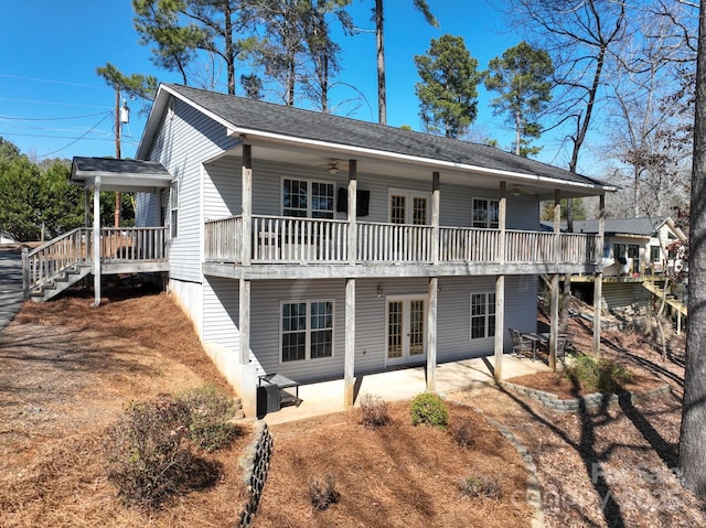 back of house with a deck, ceiling fan, stairs, french doors, and a patio area