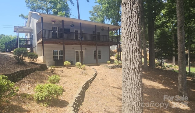 604 Fairway Shores Rd, Mount Gilead, NC 27306 - rear view of property featuring a deck