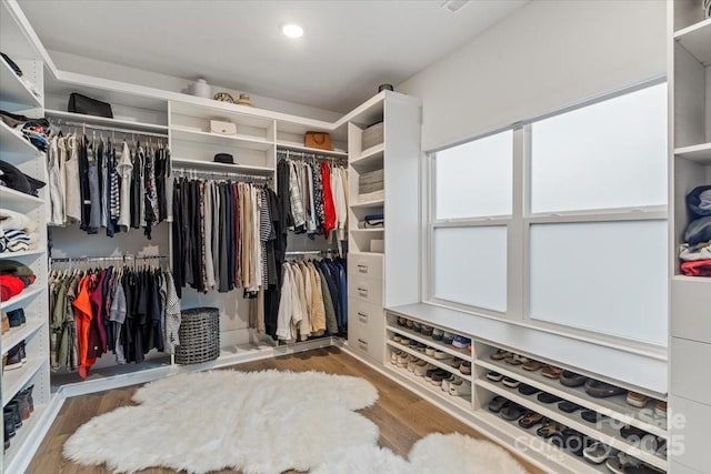 spacious closet with wood finished floors