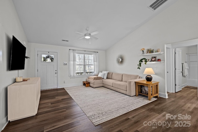 living area with lofted ceiling, ceiling fan, dark wood-style floors, and visible vents