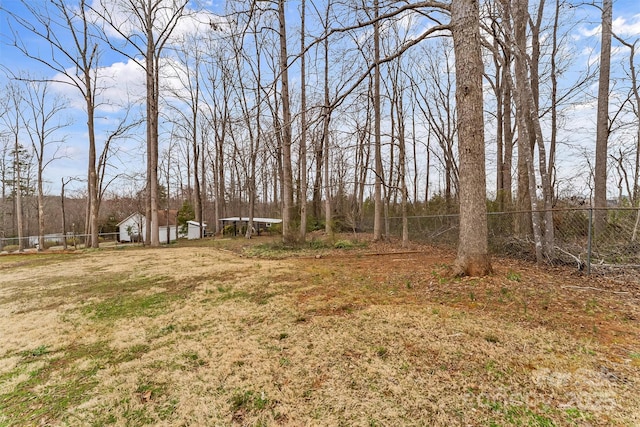 view of yard with fence