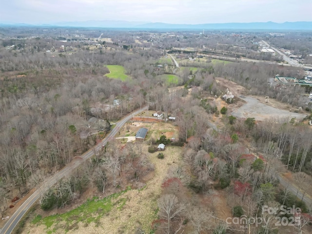 bird's eye view with a mountain view