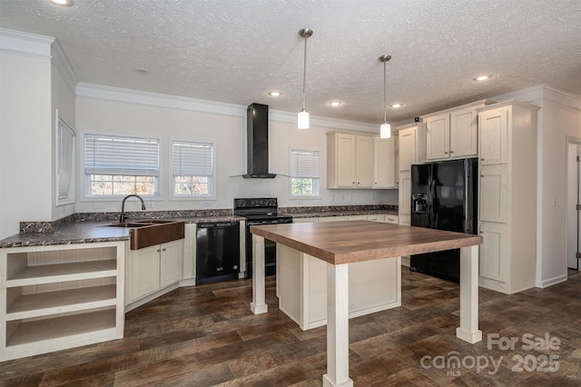 kitchen featuring open shelves, butcher block countertops, a sink, wall chimney exhaust hood, and black appliances