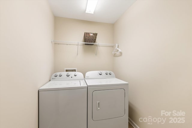 laundry room with washing machine and dryer and laundry area