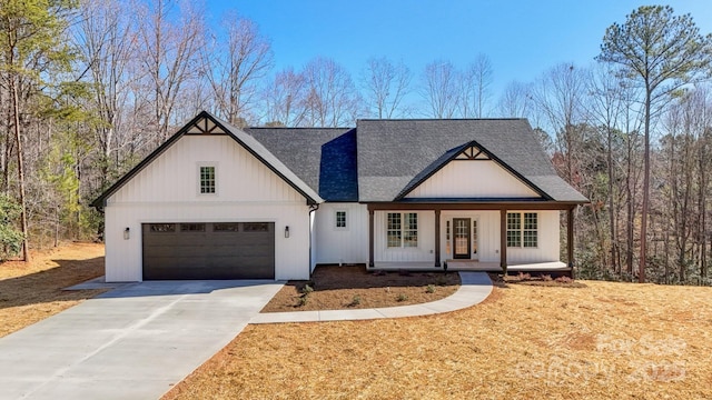 modern farmhouse style home featuring a garage, a porch, concrete driveway, and a shingled roof