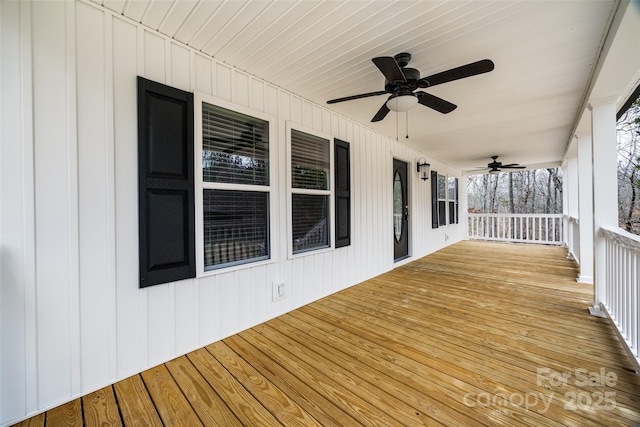 deck featuring a ceiling fan and covered porch