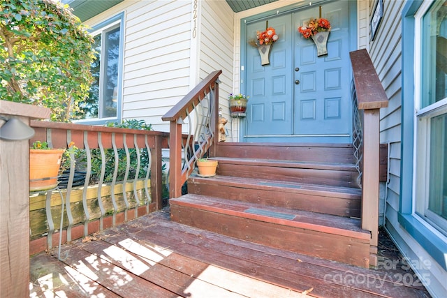 entrance to property with covered porch