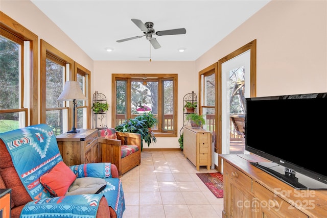 interior space featuring a healthy amount of sunlight and a ceiling fan