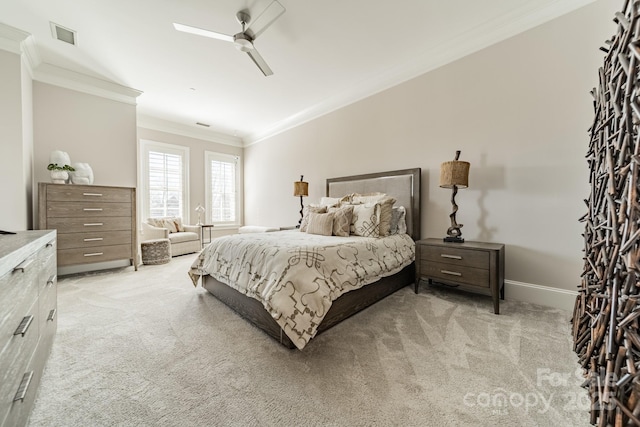 bedroom with visible vents, baseboards, ceiling fan, ornamental molding, and light colored carpet