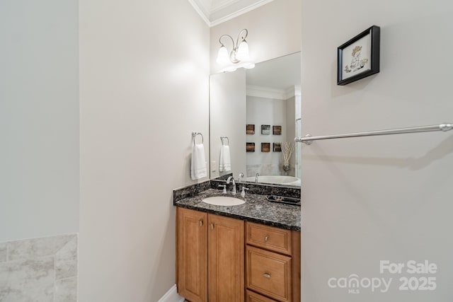 bathroom featuring vanity and crown molding