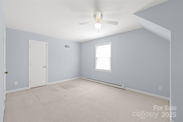 bonus room featuring visible vents, baseboards, baseboard heating, carpet flooring, and a ceiling fan