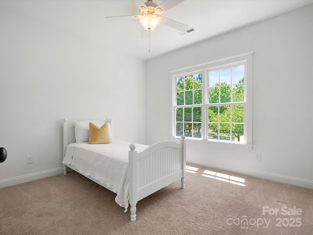 bedroom featuring visible vents, carpet, ceiling fan, and baseboards
