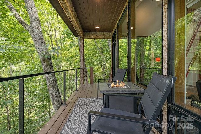 deck featuring a fire pit