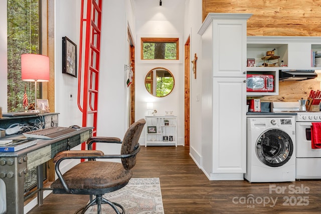 laundry room with washer / clothes dryer, dark wood-style flooring, and laundry area