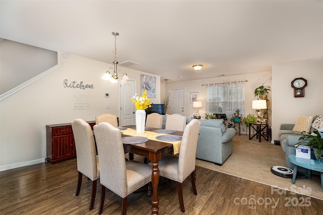 1301 Waylon Ave, Gastonia, NC 28054 - dining room featuring dark wood-type flooring and baseboards