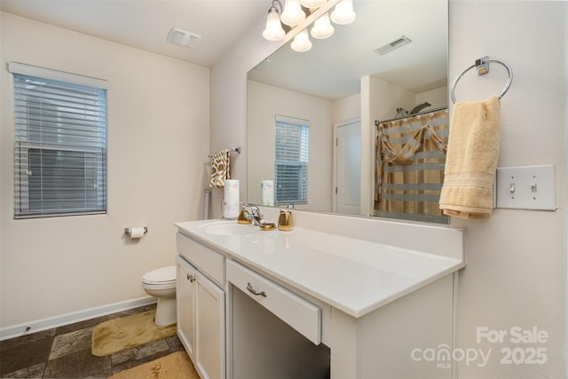 1301 Waylon Ave, Gastonia, NC 28054 - bathroom with baseboards, vanity, toilet, a shower with curtain, and a chandelier