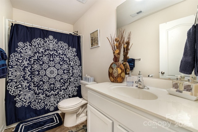 1301 Waylon Ave, Gastonia, NC 28054 - bathroom featuring vanity, toilet, and curtained shower