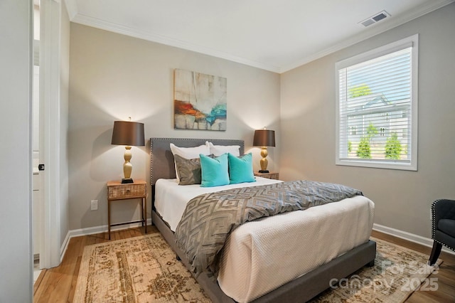 9843 Quercus Ln, Huntersville, NC 28078 - bedroom with crown molding, light wood-style flooring, and baseboards