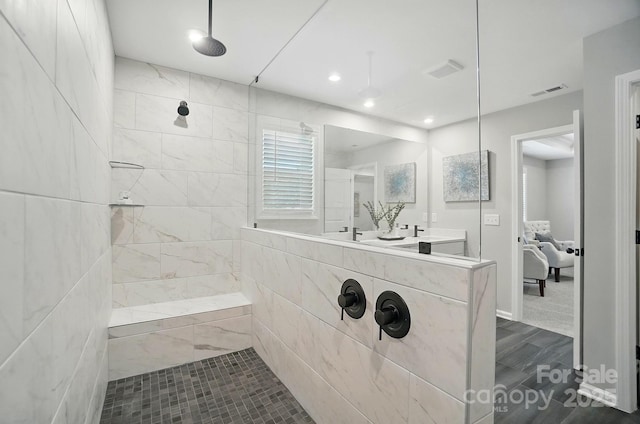 9843 Quercus Ln, Huntersville, NC 28078 - ensuite bathroom with tiled shower, vanity, and recessed lighting