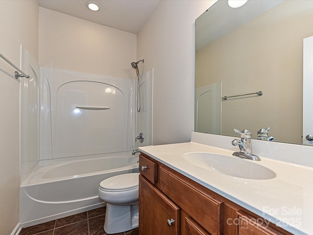 bathroom with tile patterned flooring, shower / washtub combination, toilet, and vanity