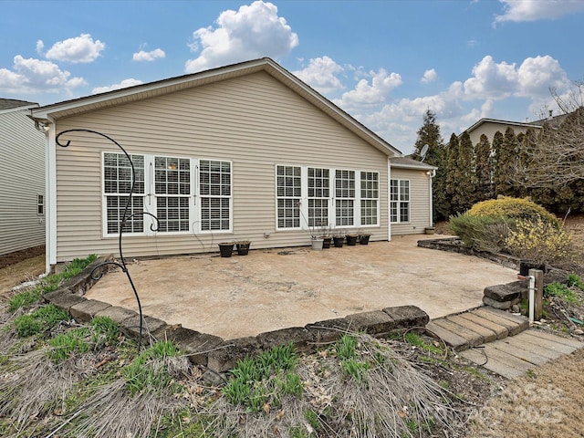 rear view of house featuring a patio area