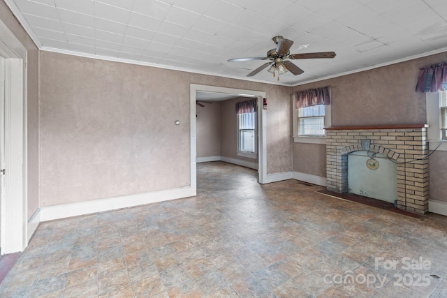 unfurnished living room featuring a fireplace, baseboards, ceiling fan, and ornamental molding