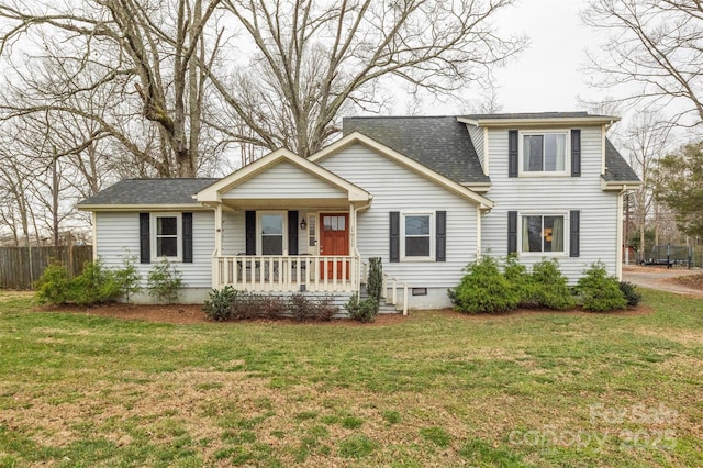 traditional-style house with a front lawn, fence, covered porch, roof with shingles, and crawl space