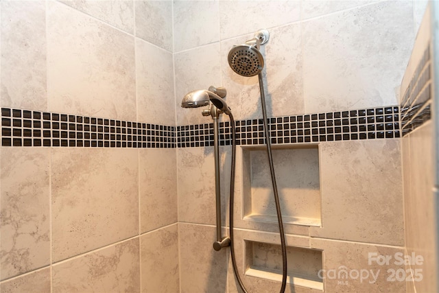 room details with a tile shower