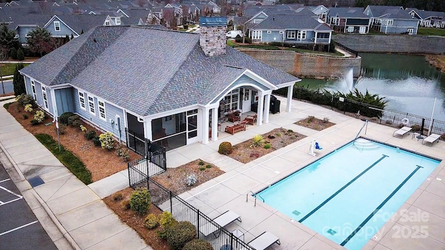16116 Lakeside Loop Ln, Cornelius, NC 28031 - aerial perspective of suburban area featuring a pool and a nearby body of water