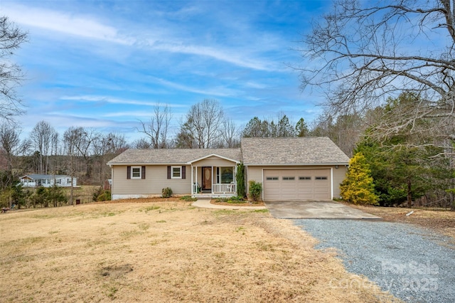 ranch-style home with covered porch, a garage, concrete driveway, roof with shingles, and a front lawn