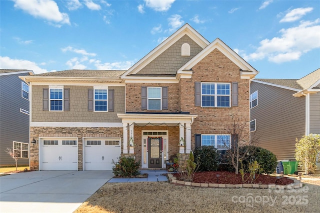 view of front of house featuring a garage, stone siding, brick siding, and concrete driveway