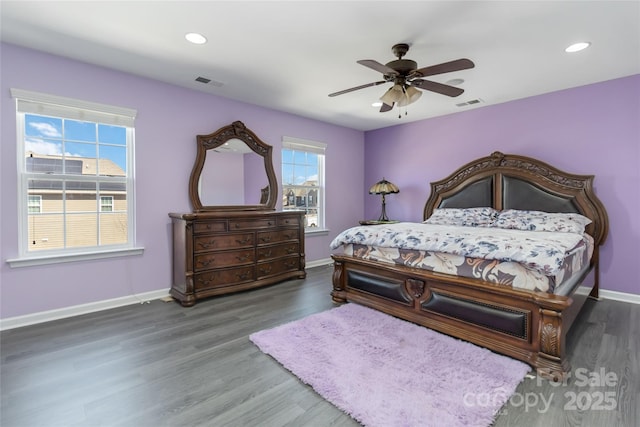 bedroom featuring recessed lighting, visible vents, baseboards, and wood finished floors