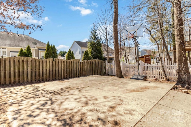 exterior space featuring a gate and fence