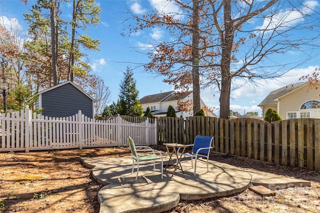 view of yard featuring a patio and a fenced backyard