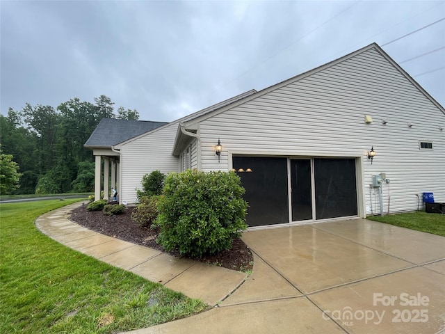 7034 Pin Oaks Dr, Denver, NC 28037 - view of property exterior with concrete driveway, an attached garage, and a yard
